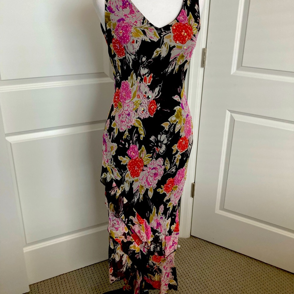 Gorgeous long flowers beaded dress. Never worn still has tags.